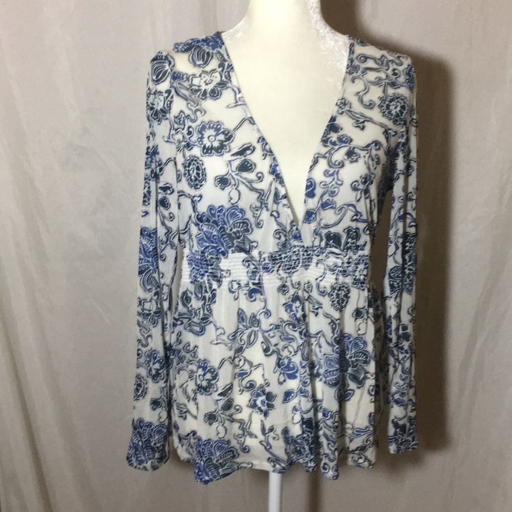 New York and Co Long Sleeve V neck Sheer blouse.